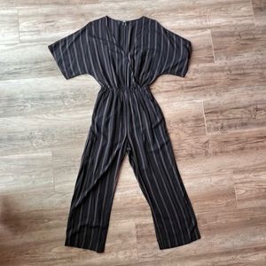 Paige black/ current striped jumpsuit size medium Preowned great condition